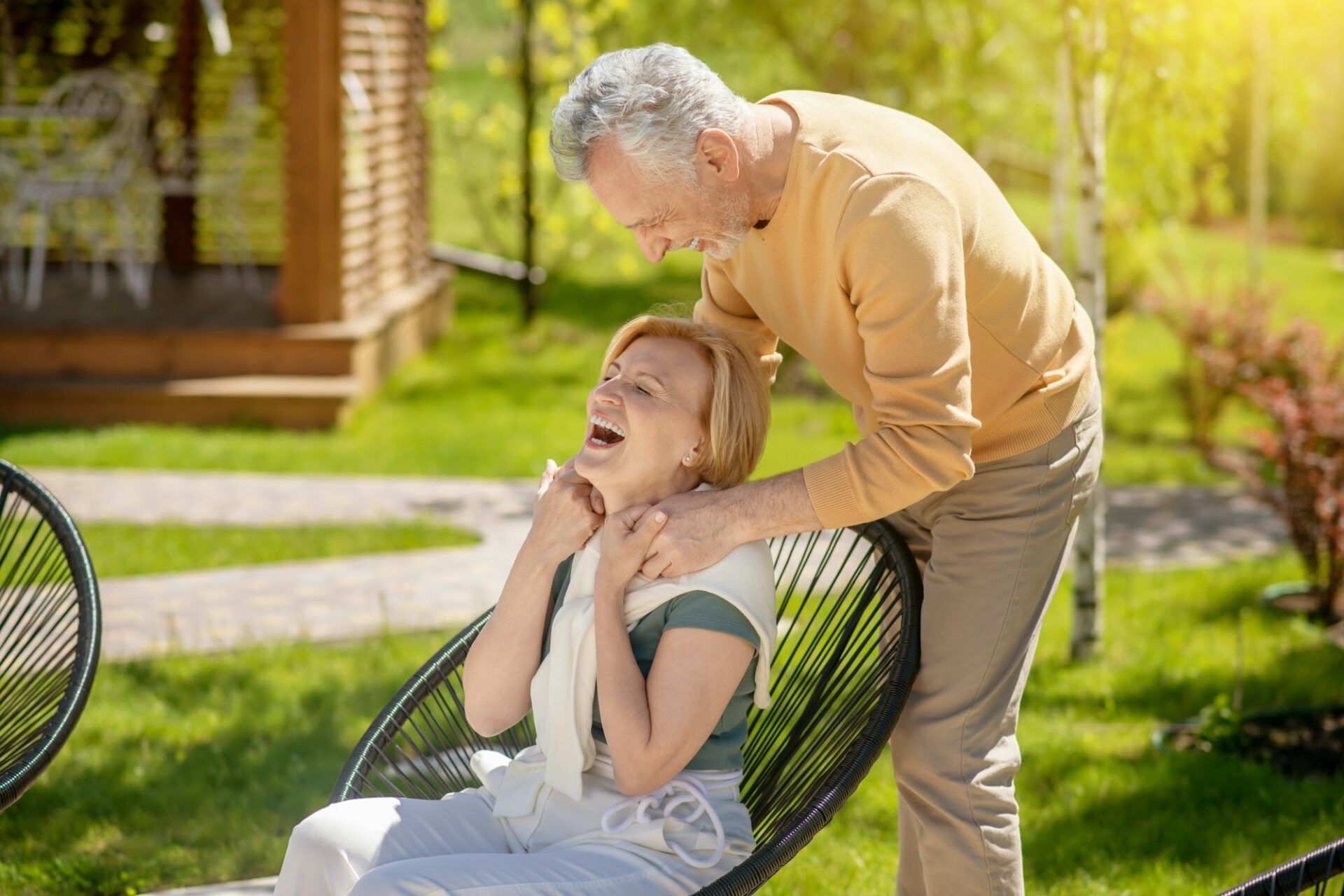 Mature couple having a good time in the garden